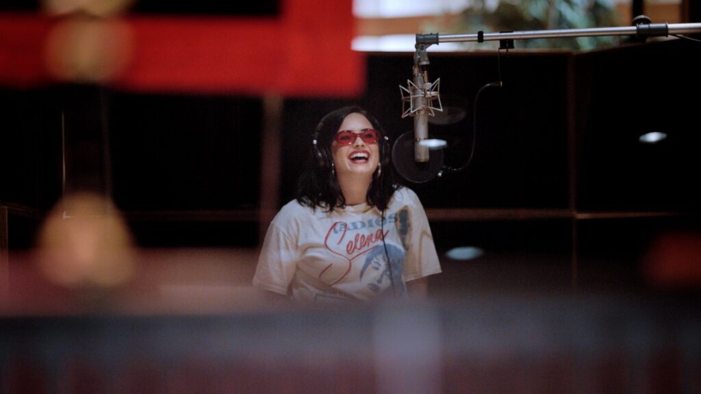 Demi Lovato singing in studio in Demi Lovato Dancing with the Devil documentary series