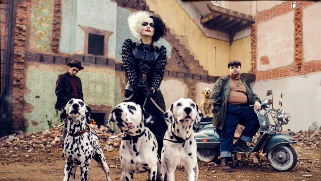 Emma Stone as Cruella with dalmatians