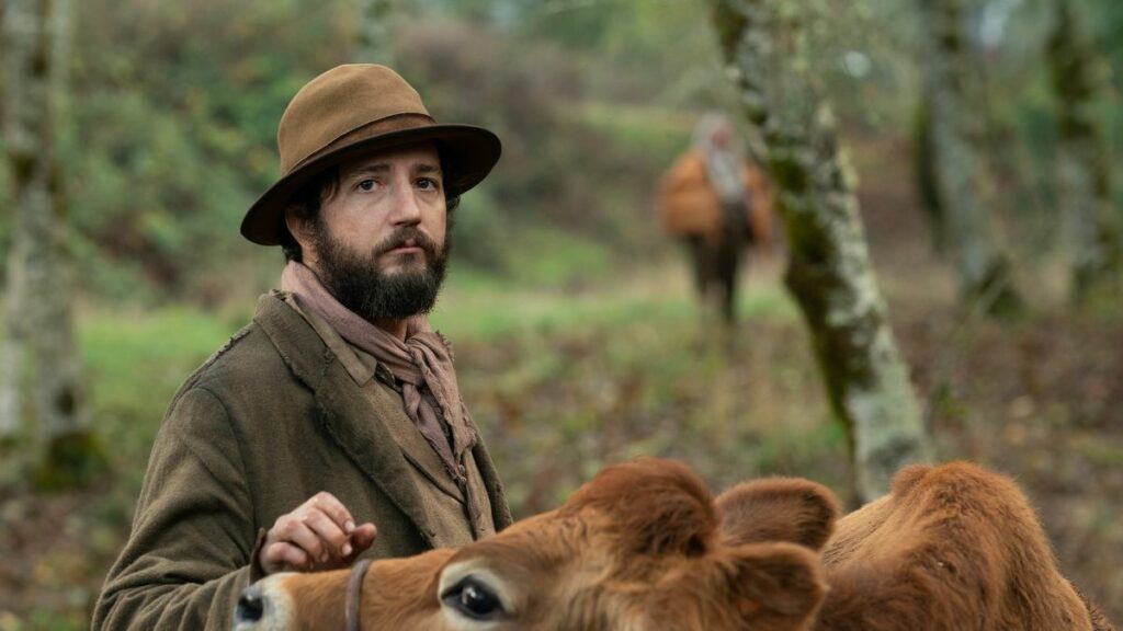 john Magaro and the cow Evie in First Cow