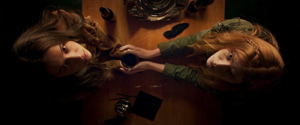 Elle Callahan social horror Witch Hunt with Gideon Adlon as Claire and Abigail Cowen as Fiona